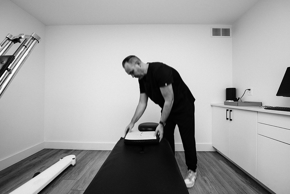 Dr. Kyle Zimmerman preparing for adjustment.